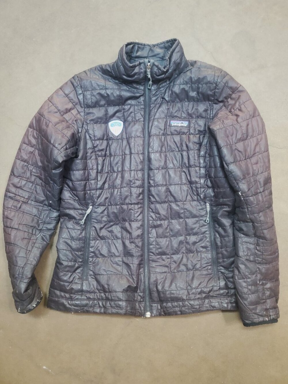 Patagonia Women’s Nano Puff Jacket - Black Size M Flawed Well-Worn PSIA patch